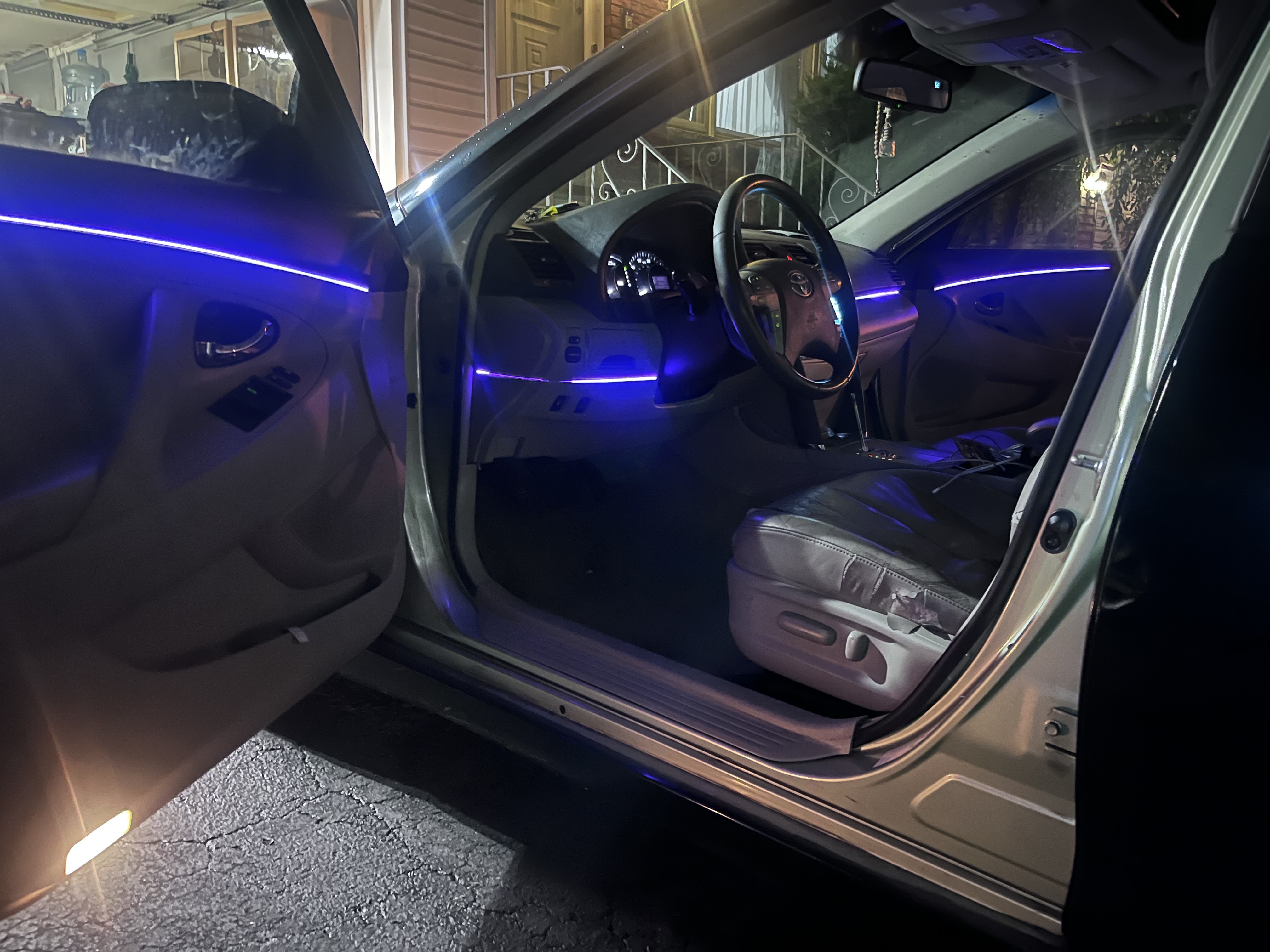 Full car interior glowing with ambient lights