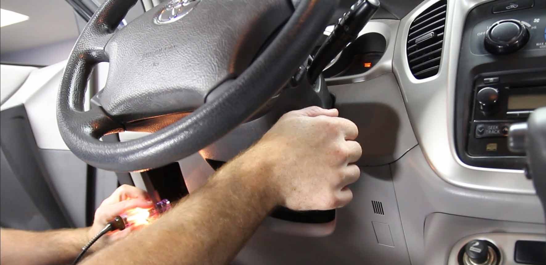 Using a test light to find ignition fuse in car interior fuse box