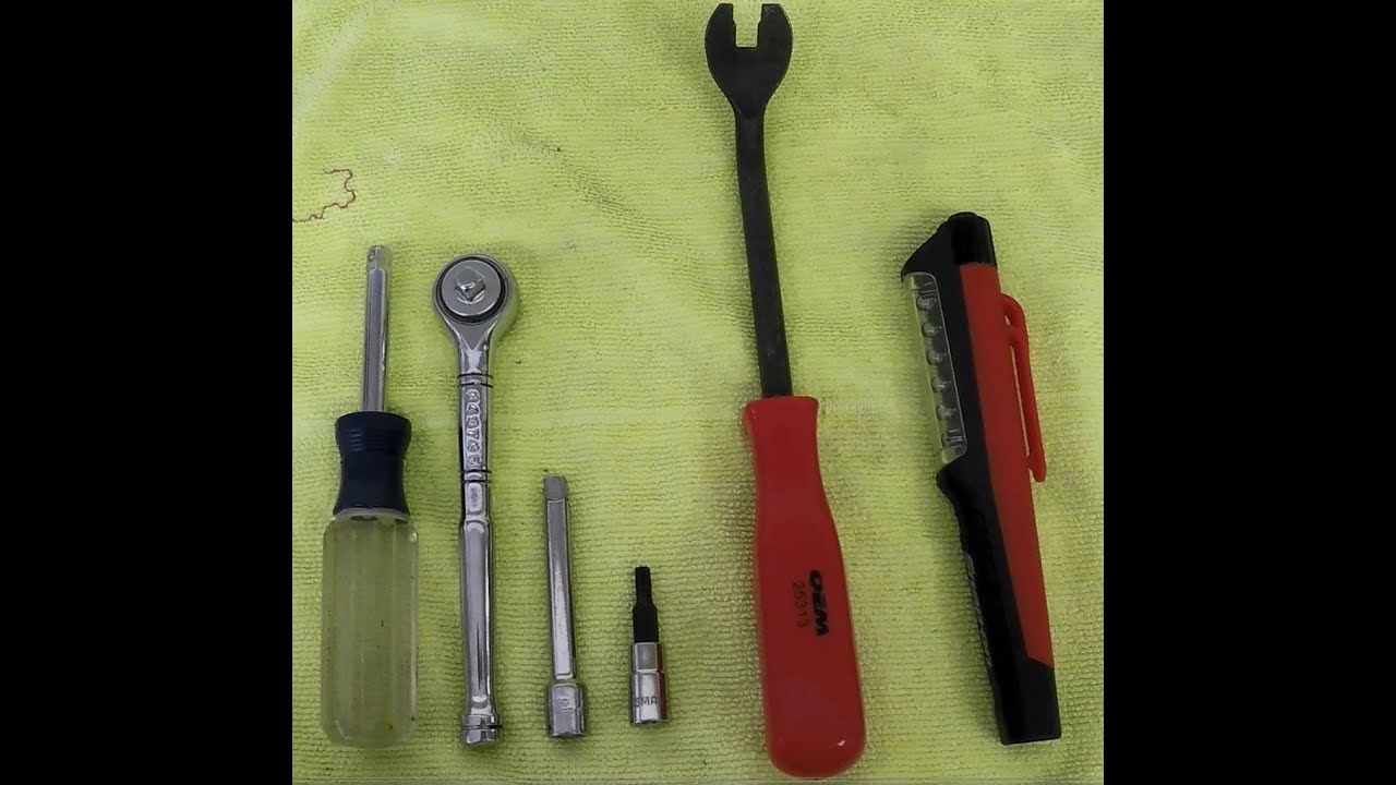A neatly organized layout of all tools on a workbench or foam-lined case.